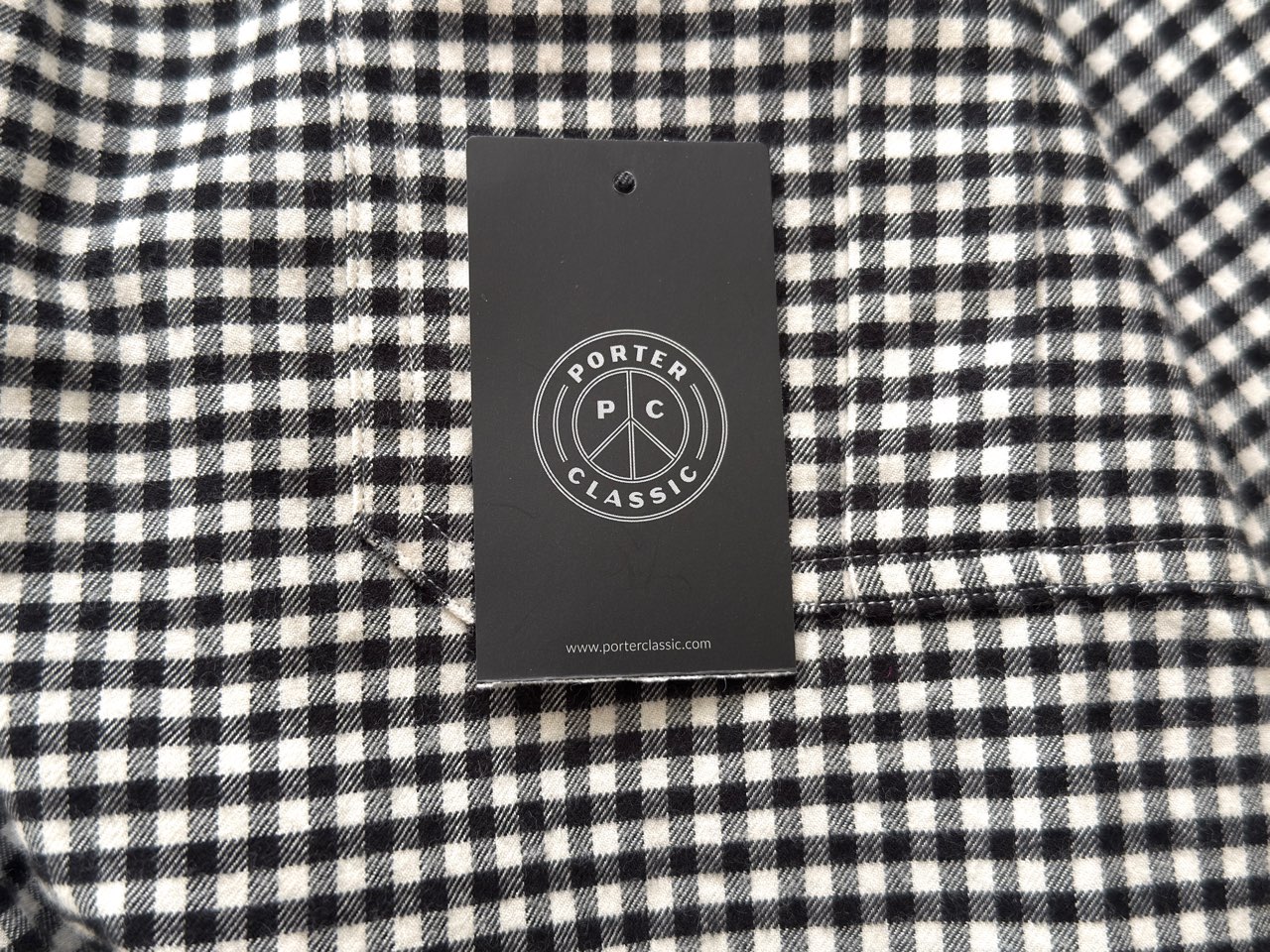 ポータークラシックのブランドタグ