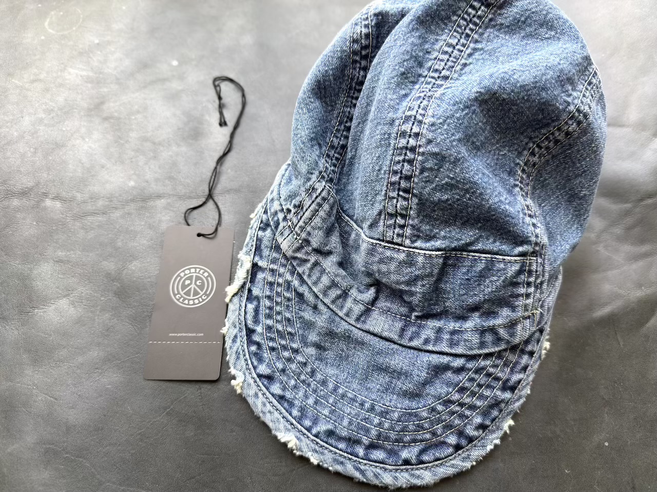 ポータークラシックのタグとキャナリィロウベースボールキャップ